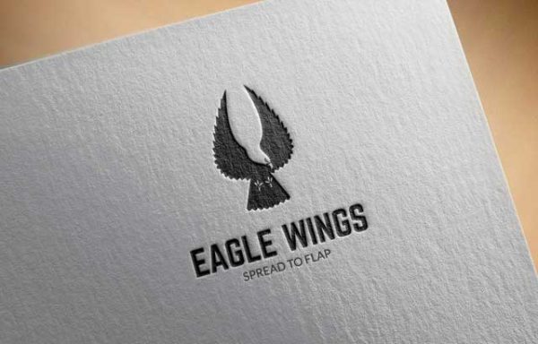 Eagle wings spread to flap logo design